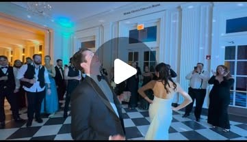 Lucas Sanor performing at a wedding reception dance floor
